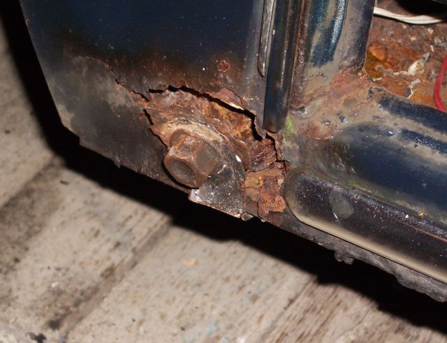 damage to the body where rust held the bolt on